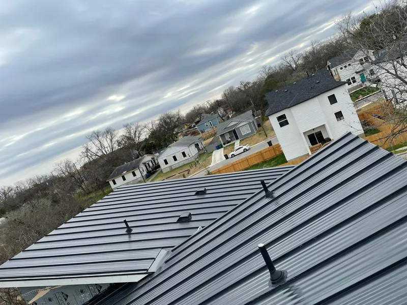 Standing seam metal roof panels with vents for Skylight Repair in Timberlane